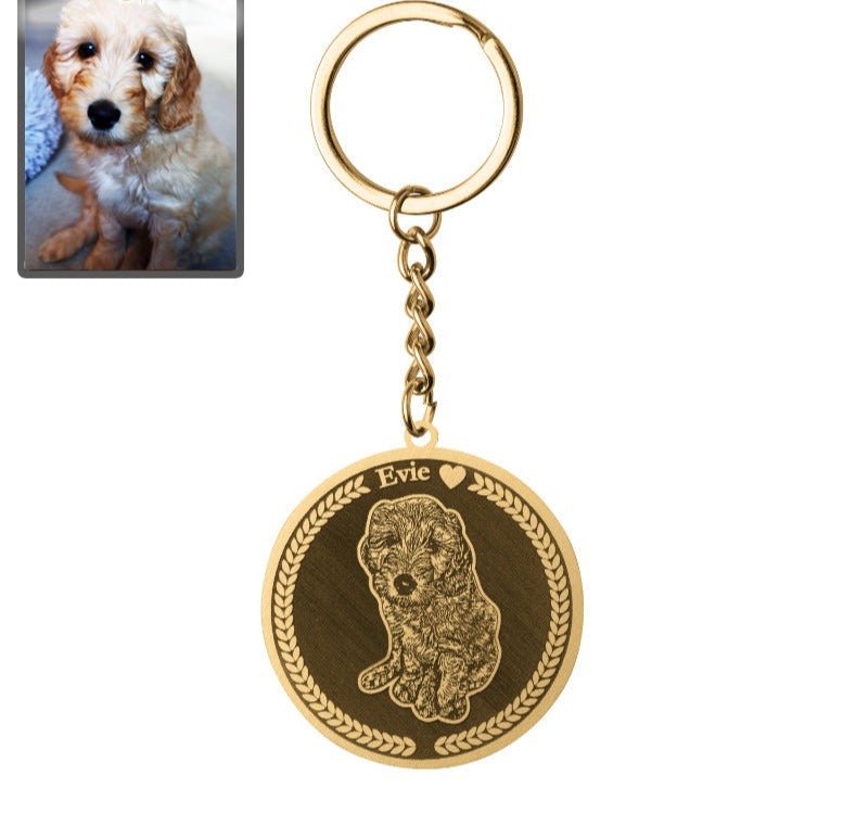 Nøkkelring med rund medaljong og hundesilhuett