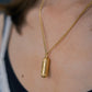 Event capsule necklace